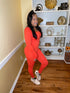 All She Needs - orange jumpsuit (pumpkin)